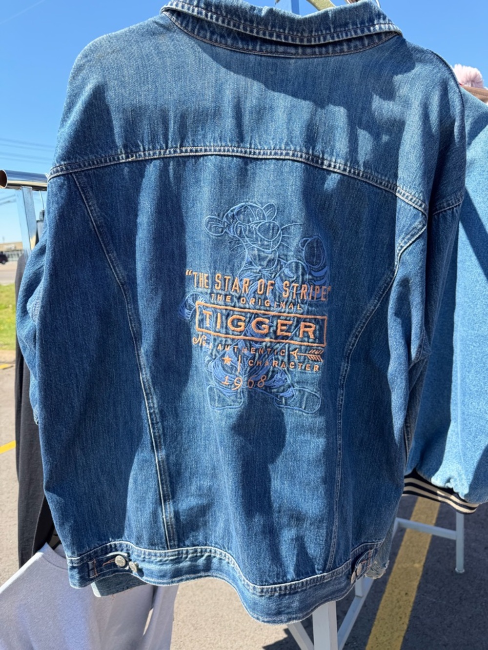 Denim Jacket with Embroidered Character and Orange Logo